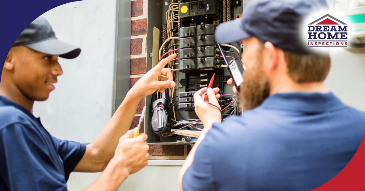 Two home inspectors evaluating an electrical panel during a property inspection
