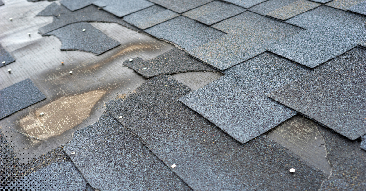 Roof shingles displaced from a storm or age.