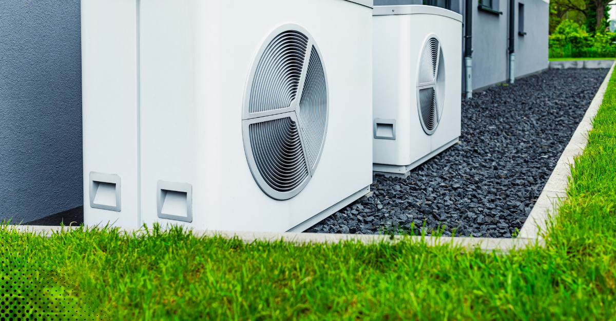 Modern heat pump units outside a home